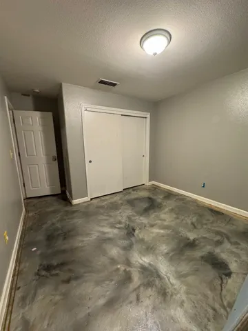 an empty room with a door