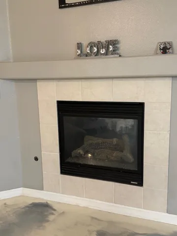a fireplace with glass door