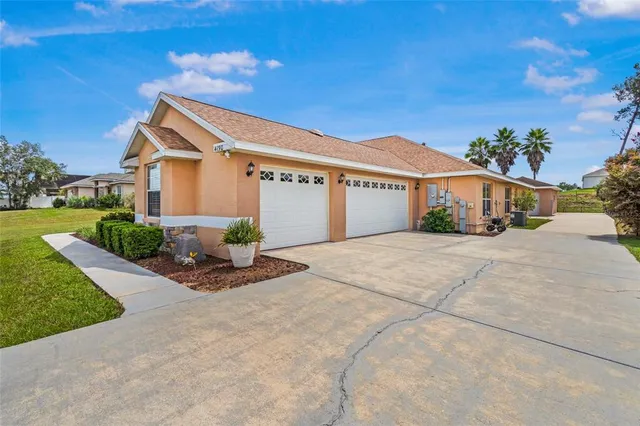 a view of a livingroom with furniture and windows