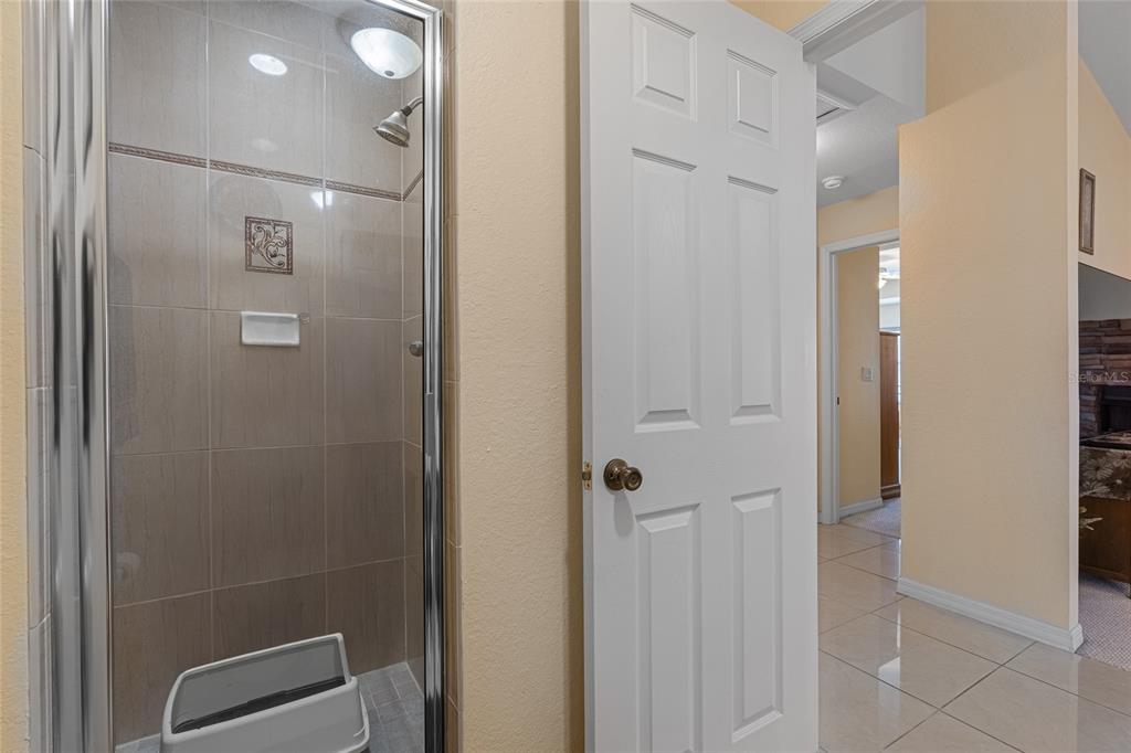 4190 Southwest 103rd Street Road Ocala, FL 34476 - Photo 24 of 55 a bathroom with a shower