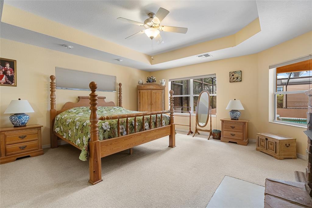 4190 Southwest 103rd Street Road Ocala, FL 34476 - Photo 25 of 55 a bedroom with furniture and a window