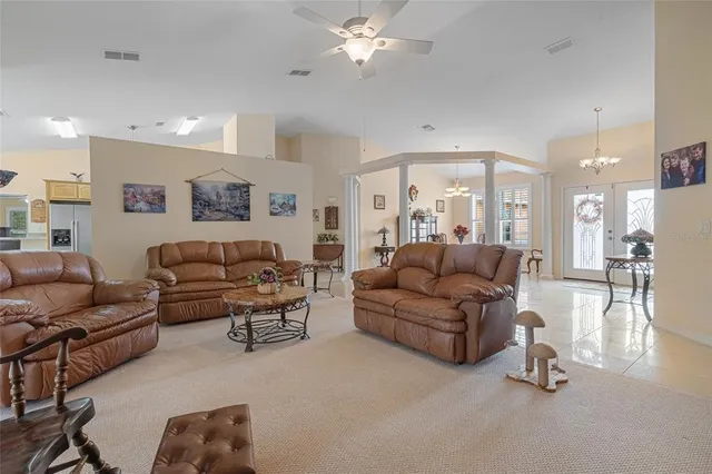 a kitchen with stainless steel appliances granite countertop a sink and dishwasher a oven with wooden cabinets
