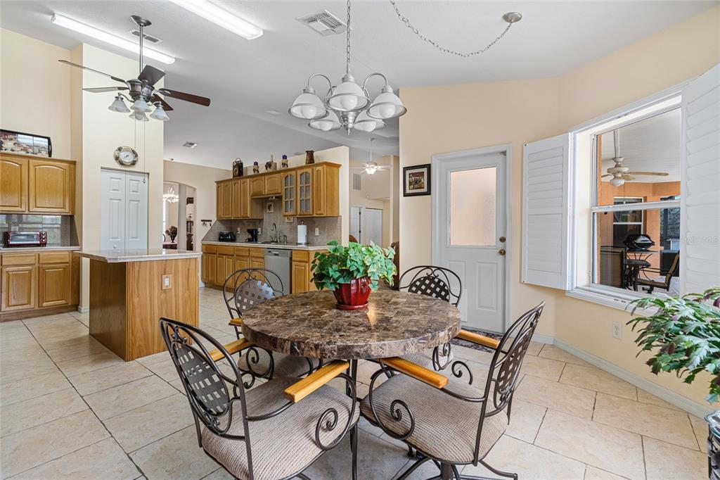 4190 Southwest 103rd Street Road Ocala, FL 34476 - Photo 39 of 55 a view of a dining room with furniture