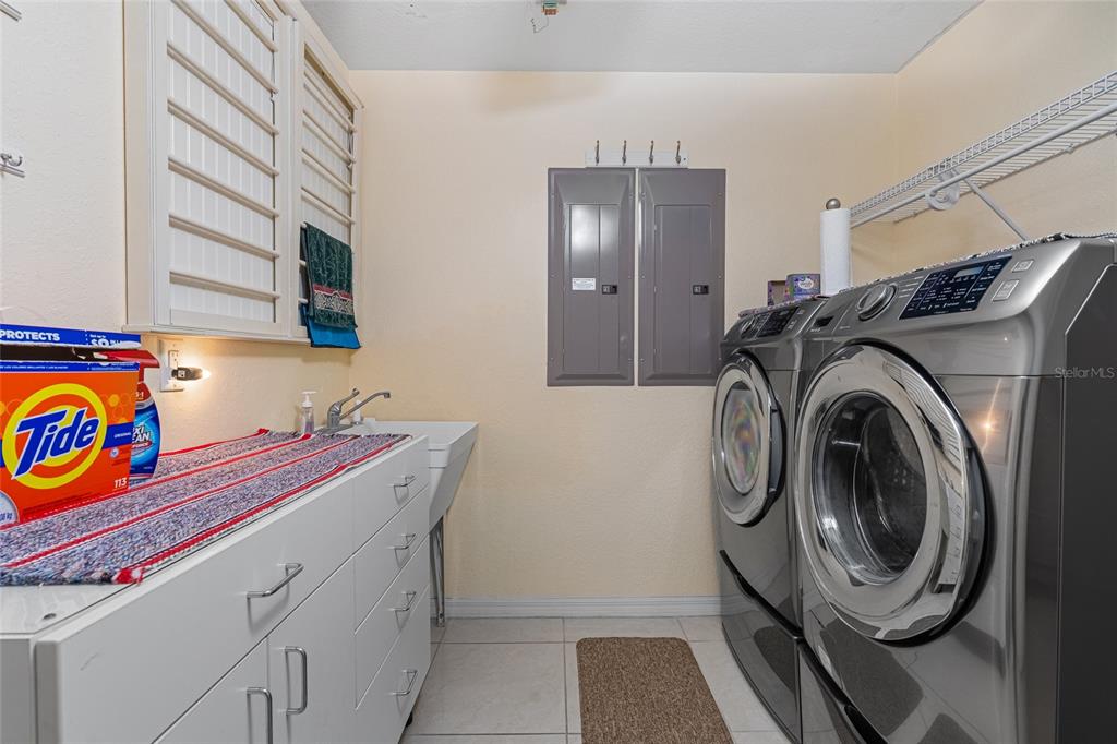 4190 Southwest 103rd Street Road Ocala, FL 34476 - Photo 52 of 55 a utility room with dryer and washer