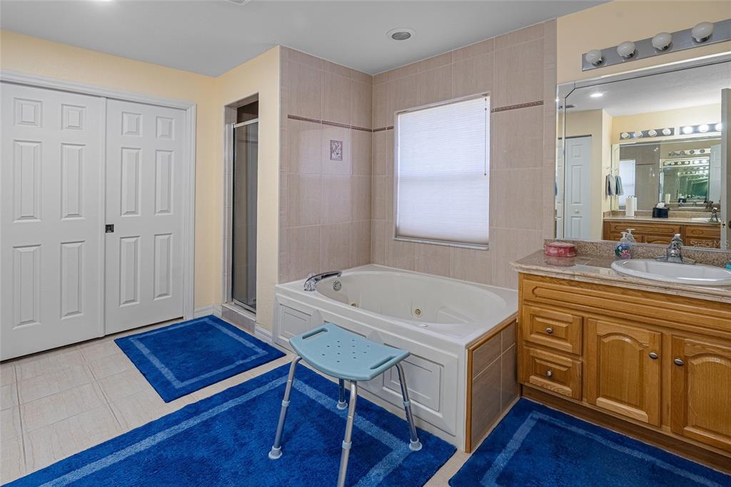 4190 Southwest 103rd Street Road Ocala, FL 34476 - Photo 54 of 55 a room with furniture and wooden floor