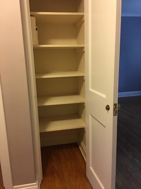 628 Olympia Road Pittsburgh, PA 15211 - Photo 8 of 15 a view of walk in closet with empty racks