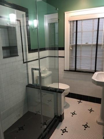 628 Olympia Road Pittsburgh, PA 15211 - Photo 9 of 15 a bathroom with a sink and mirror