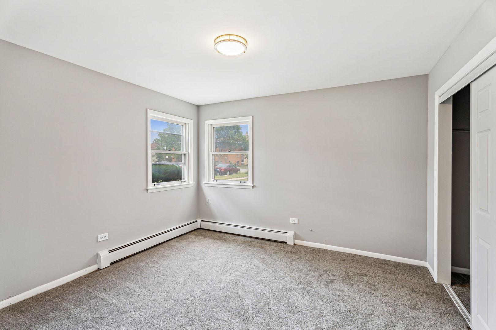 4247 North Keystone Avenue, Unit 1 Chicago, IL 60641 - Photo 11 of 18 an empty room with windows