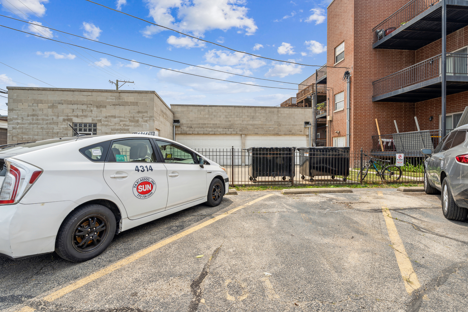 4247 North Keystone Avenue, Unit 1 Chicago, IL 60641 - Photo 17 of 18 a car parked in front of a building