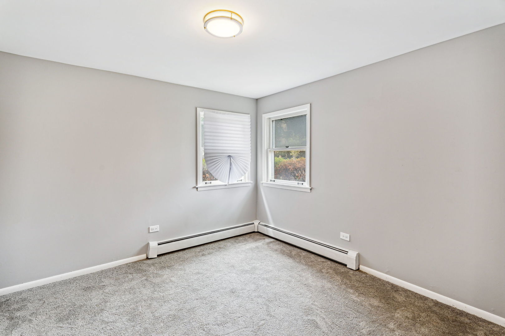 4247 North Keystone Avenue, Unit 1 Chicago, IL 60641 - Photo 7 of 18 an empty room with windows