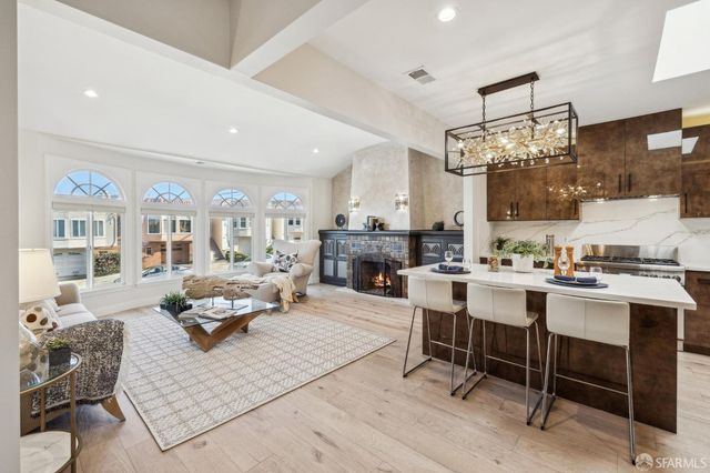 a view of kitchen and dining area with furniture