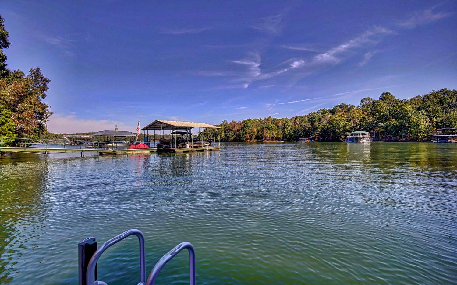 670 Reed Creek Point Hartwell, GA 30643 - Photo 3 of 4 a view of a lake with a yard