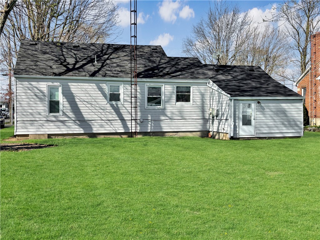 8411 Pitsburg-Laura Road Arcanum, OH 45304 - Photo 15 of 16 This charming home offers ample outdoor space and a well-maintained exterior.