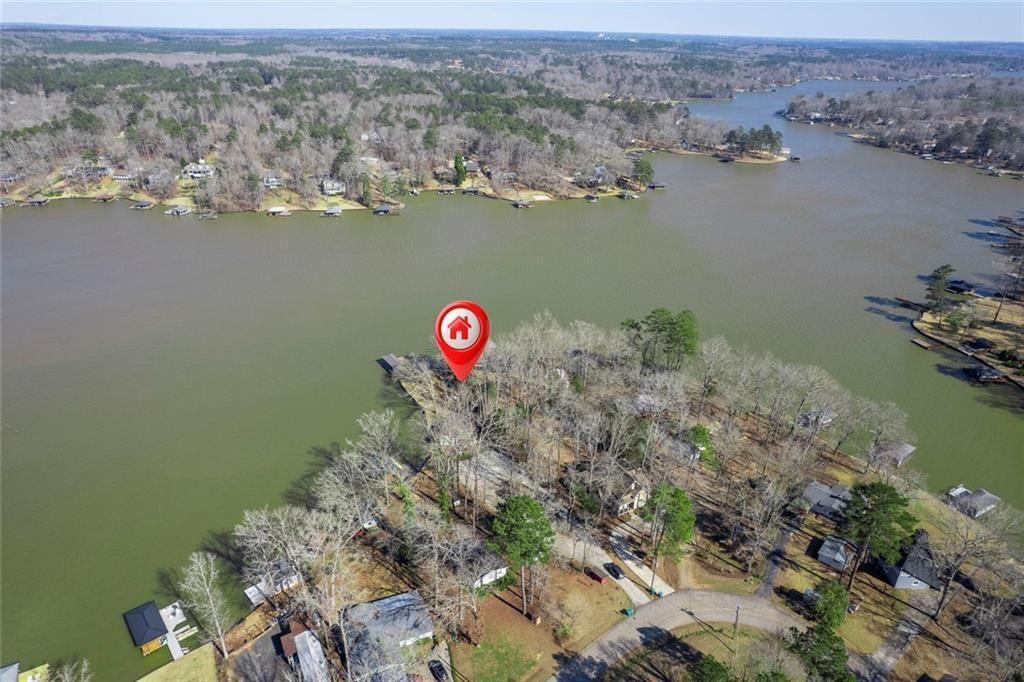 121 Little Riverview Road Eatonton, GA 31024 - Photo 5 of 53 an aerial view of a house with a lake view