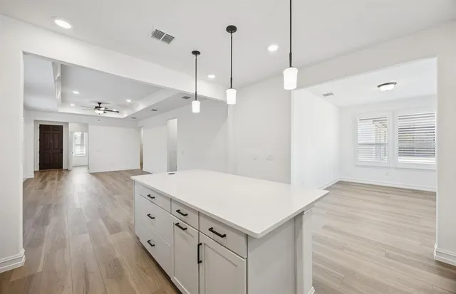a view of a kitchen and a sink