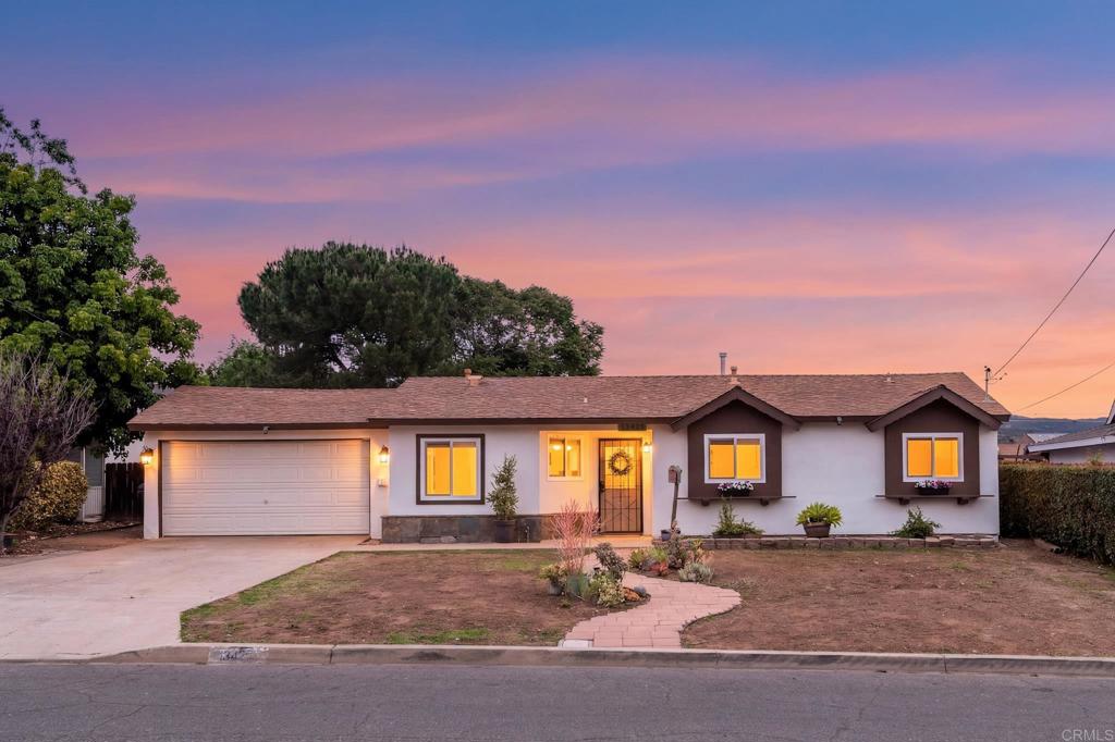 13425 Standish Drive Poway, CA 92064 - Photo 1 of 34 a front view of a house with a yard
