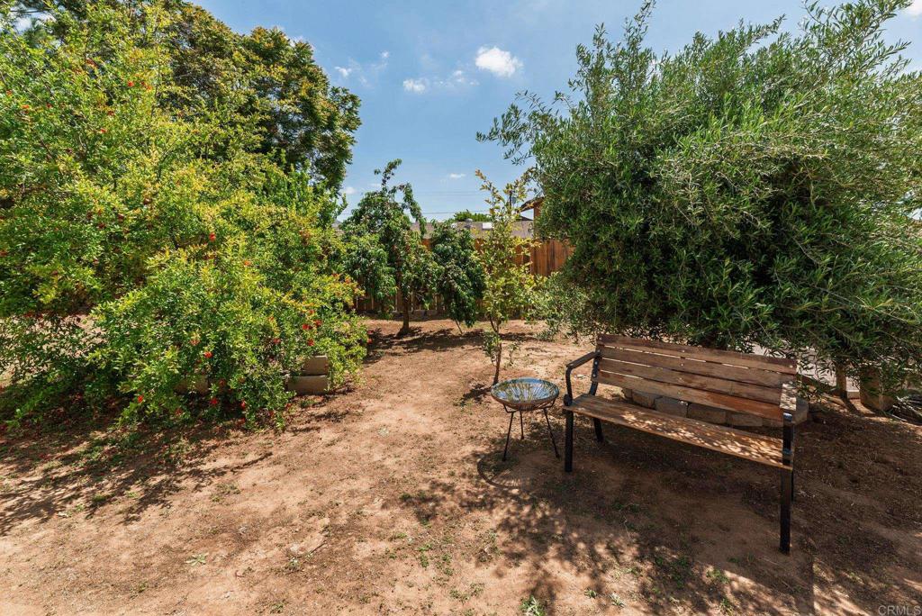 13425 Standish Drive Poway, CA 92064 - Photo 29 of 34 a view of a bench in a yard