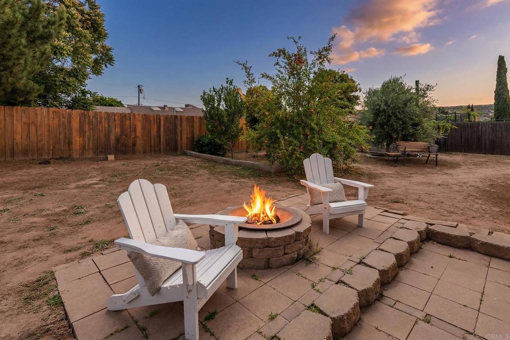 13425 Standish Drive Poway, CA 92064 - Photo 3 of 34 a backyard of a house with outdoor seating