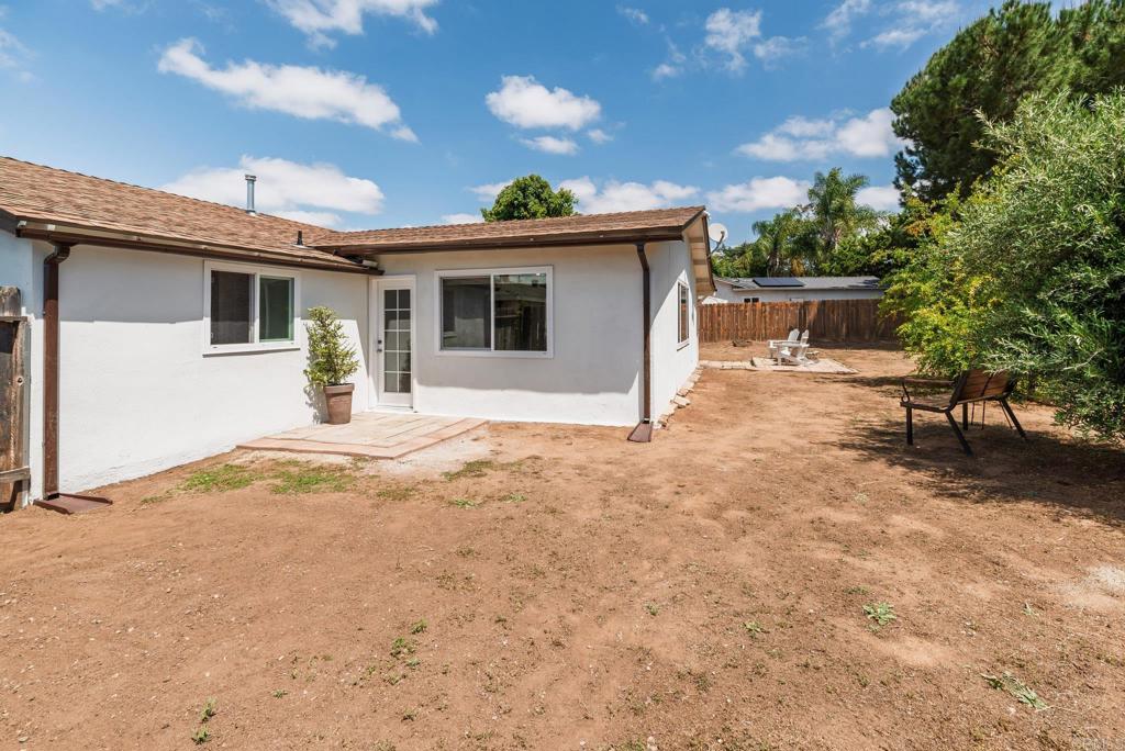 13425 Standish Drive Poway, CA 92064 - Photo 32 of 34 a view of a house with a yard and garage