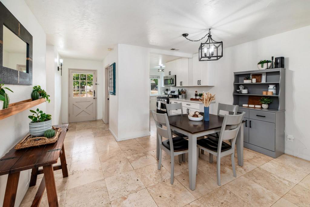 13425 Standish Drive Poway, CA 92064 - Photo 10 of 34 a view of a dining room with furniture