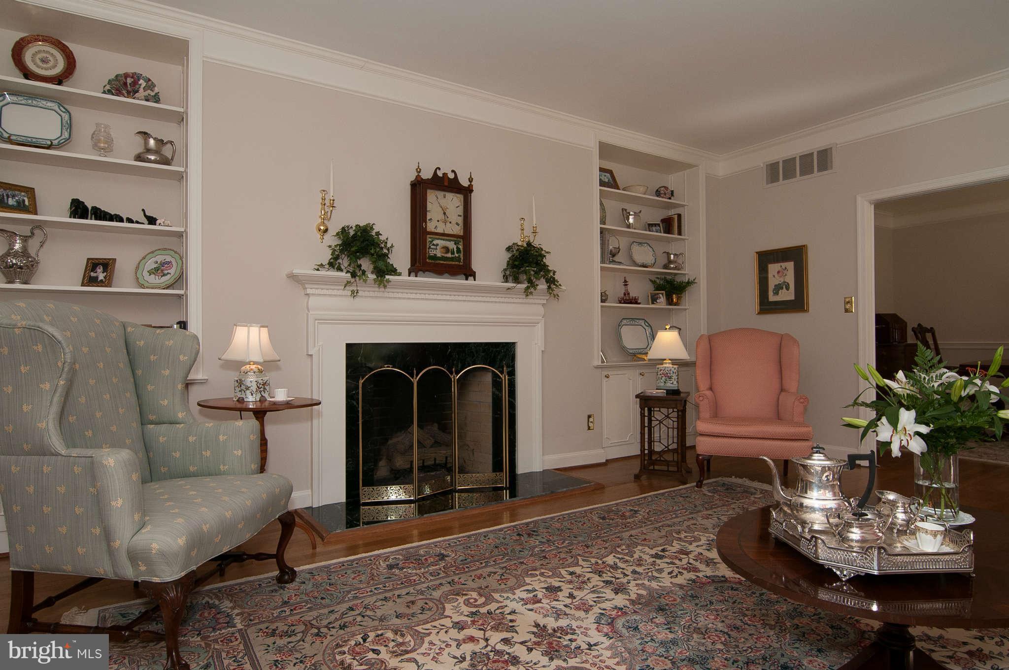 268 Providence Road Annapolis, MD 21409 - Photo 13 of 30 a living room with furniture a potted plant and a fireplace