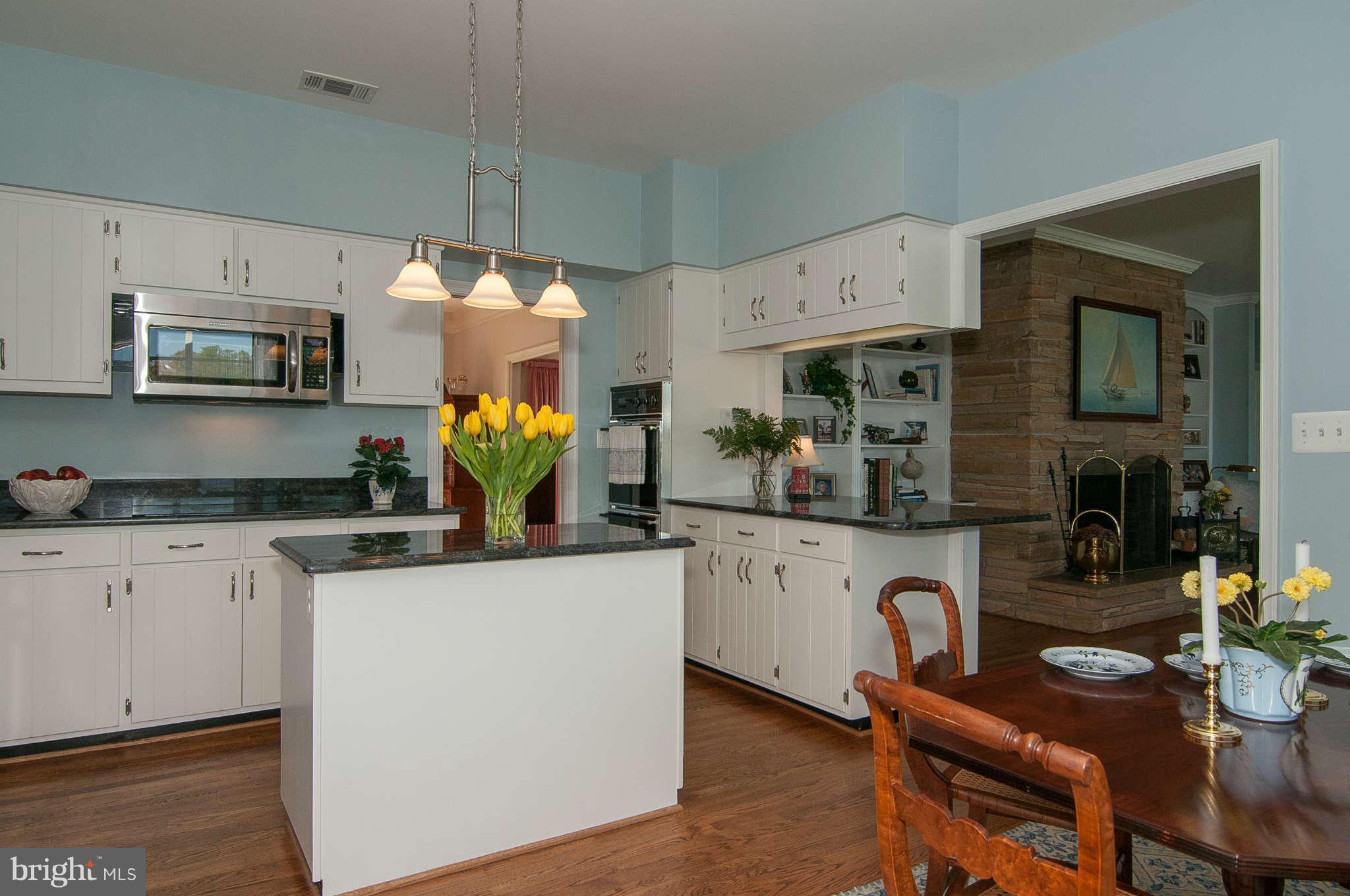 268 Providence Road Annapolis, MD 21409 - Photo 9 of 30 a kitchen with a refrigerator and a stove top oven