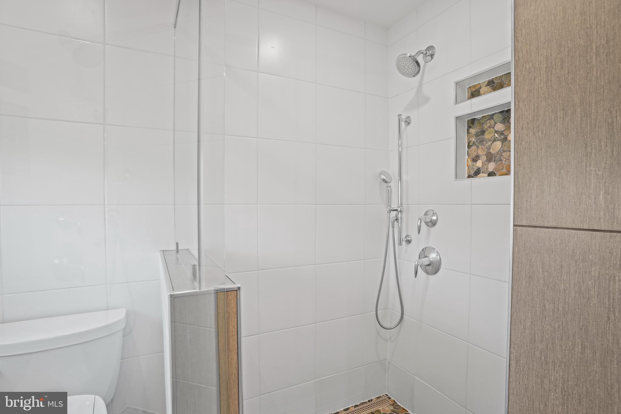 6708 Portree Court Springfield, VA 22152 - Photo 14 of 37 a bathroom with a shower