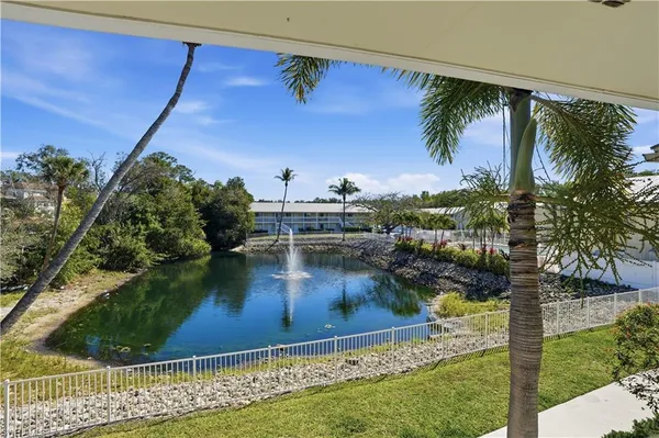a view of swimming pool from a balcony