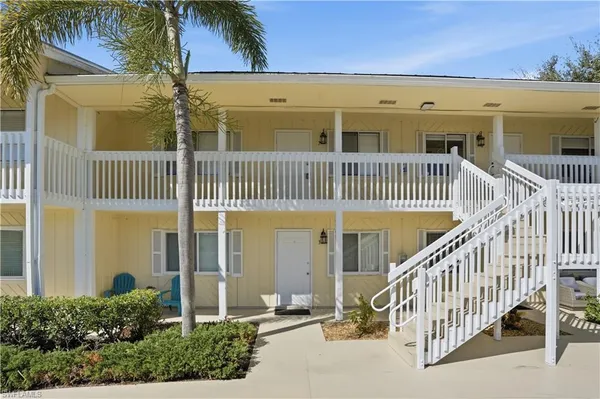 front view of a house with a staircase