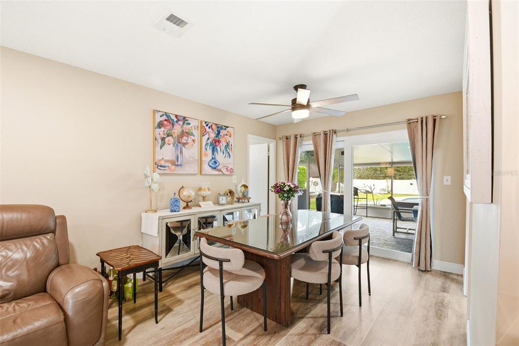 2636 Talbot Road Fern Park, FL 32730 - Photo 11 of 47 a view of a dining room with furniture window and outside view