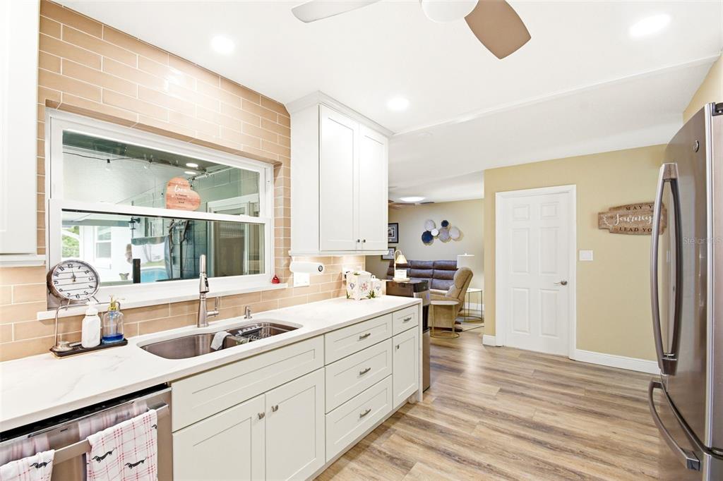 2636 Talbot Road Fern Park, FL 32730 - Photo 15 of 47 a large white kitchen with a window