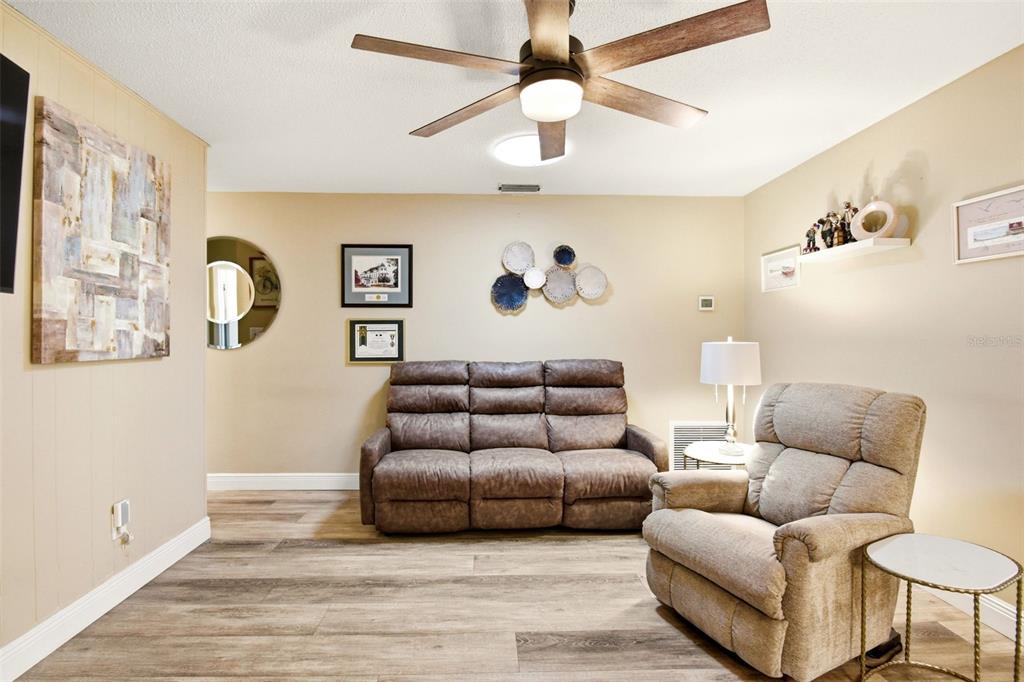 2636 Talbot Road Fern Park, FL 32730 - Photo 20 of 47 a living room with furniture and a couch