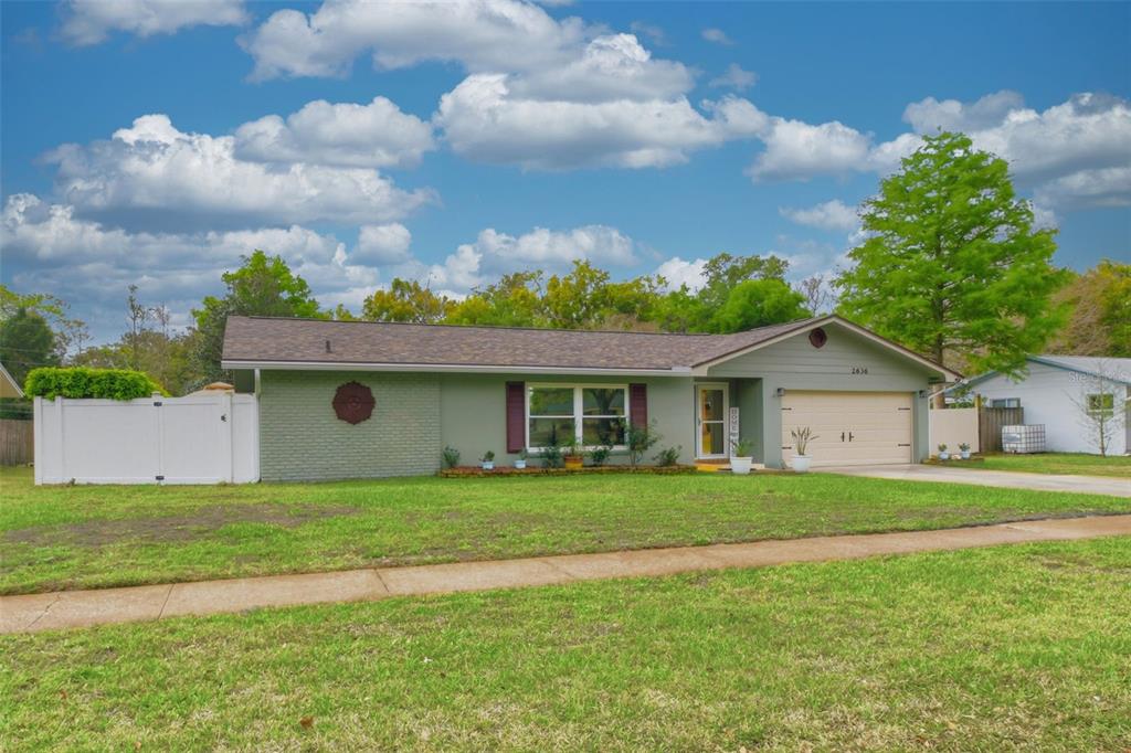 2636 Talbot Road Fern Park, FL 32730 - Photo 2 of 47 front view of a house with a yard