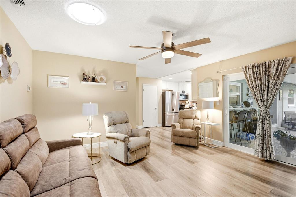 2636 Talbot Road Fern Park, FL 32730 - Photo 21 of 47 a living room with furniture and a large window