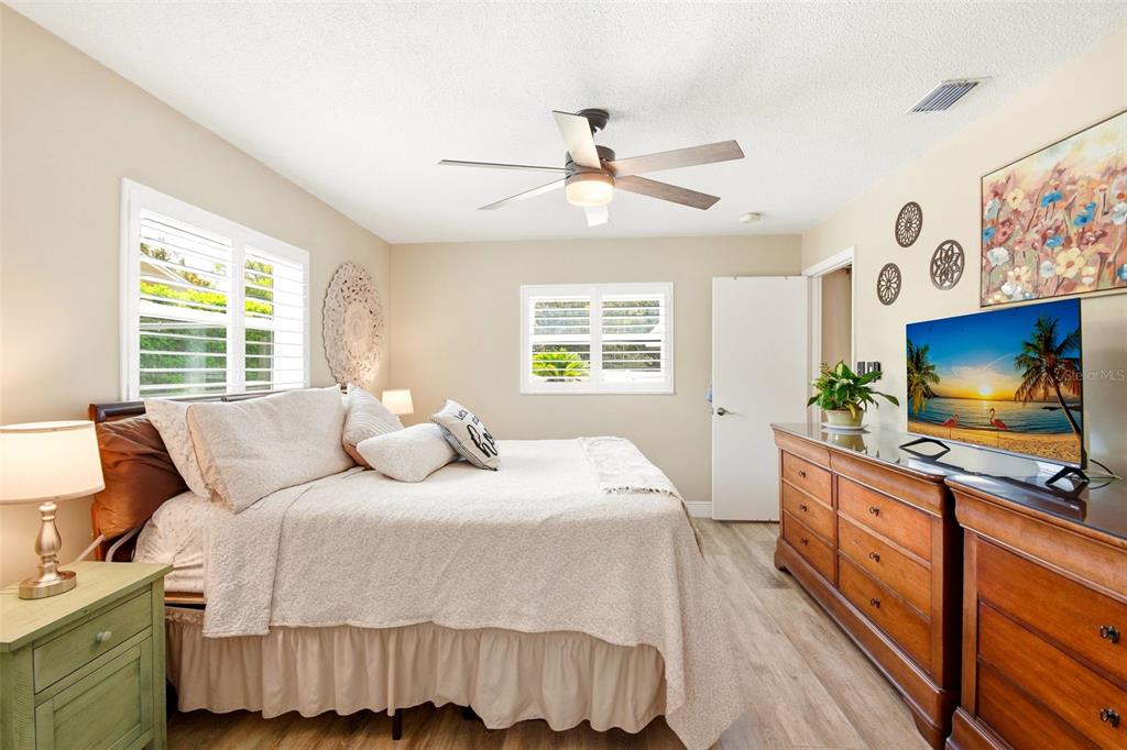 2636 Talbot Road Fern Park, FL 32730 - Photo 24 of 47 a bedroom with a bed and a flat screen tv