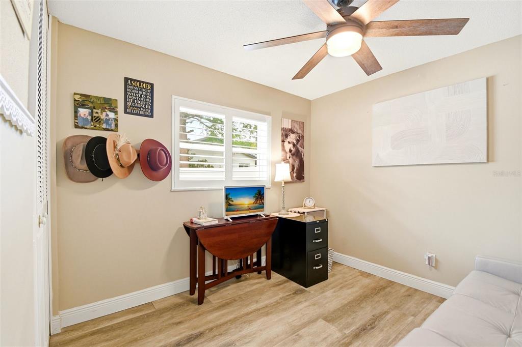 2636 Talbot Road Fern Park, FL 32730 - Photo 31 of 47 a view of a workspace with furniture and a window