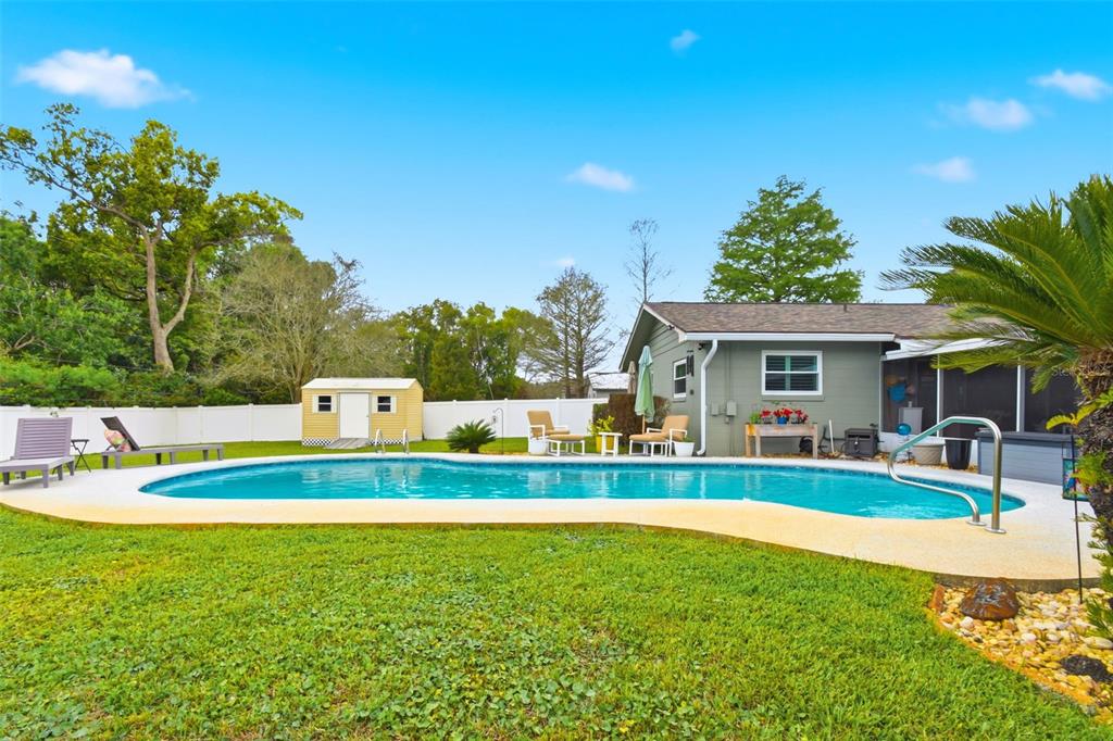 2636 Talbot Road Fern Park, FL 32730 - Photo 35 of 47 a house view with swimming pool and garden space