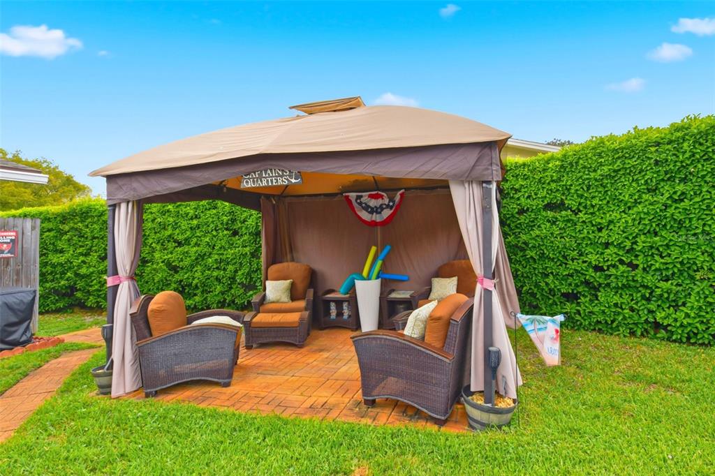 2636 Talbot Road Fern Park, FL 32730 - Photo 38 of 47 a view of an outdoor sitting area with a table and chairs