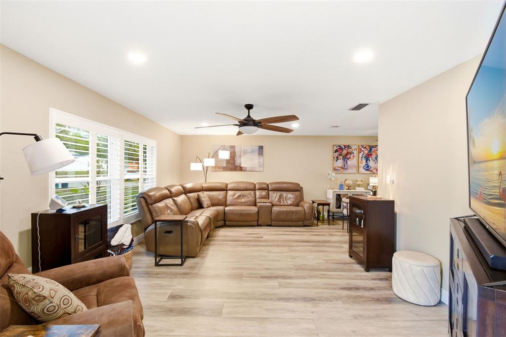 2636 Talbot Road Fern Park, FL 32730 - Photo 4 of 47 a living room with furniture and a large window