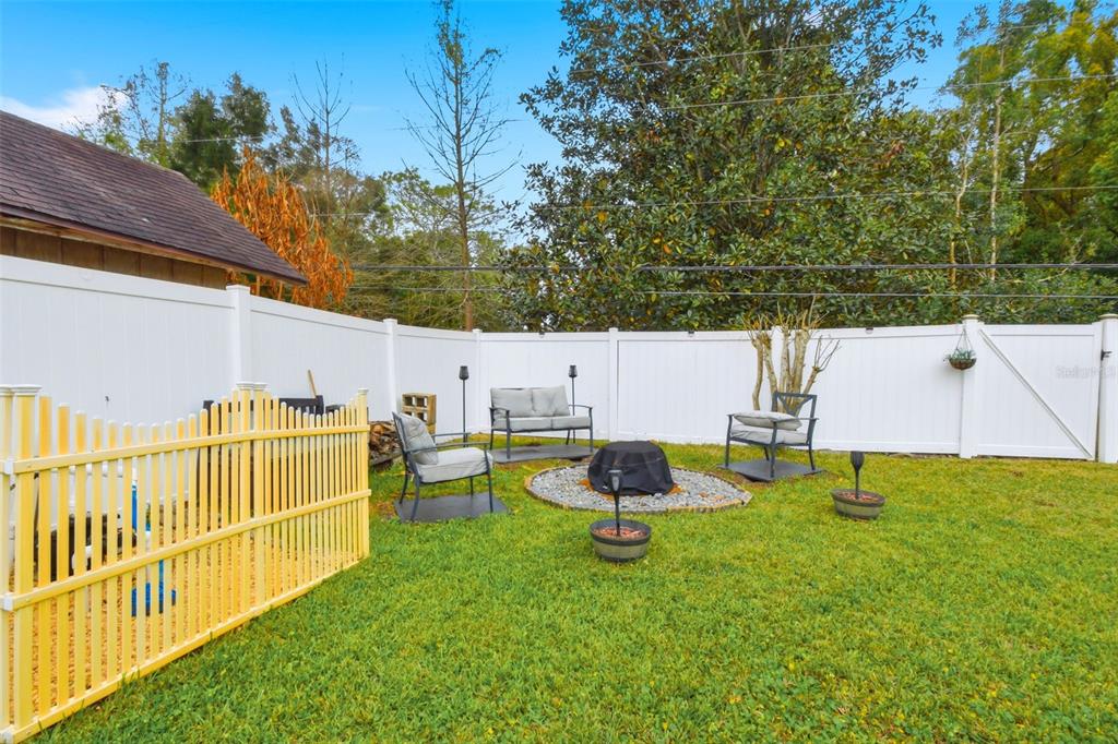 2636 Talbot Road Fern Park, FL 32730 - Photo 42 of 47 a view of an house with backyard and a tree