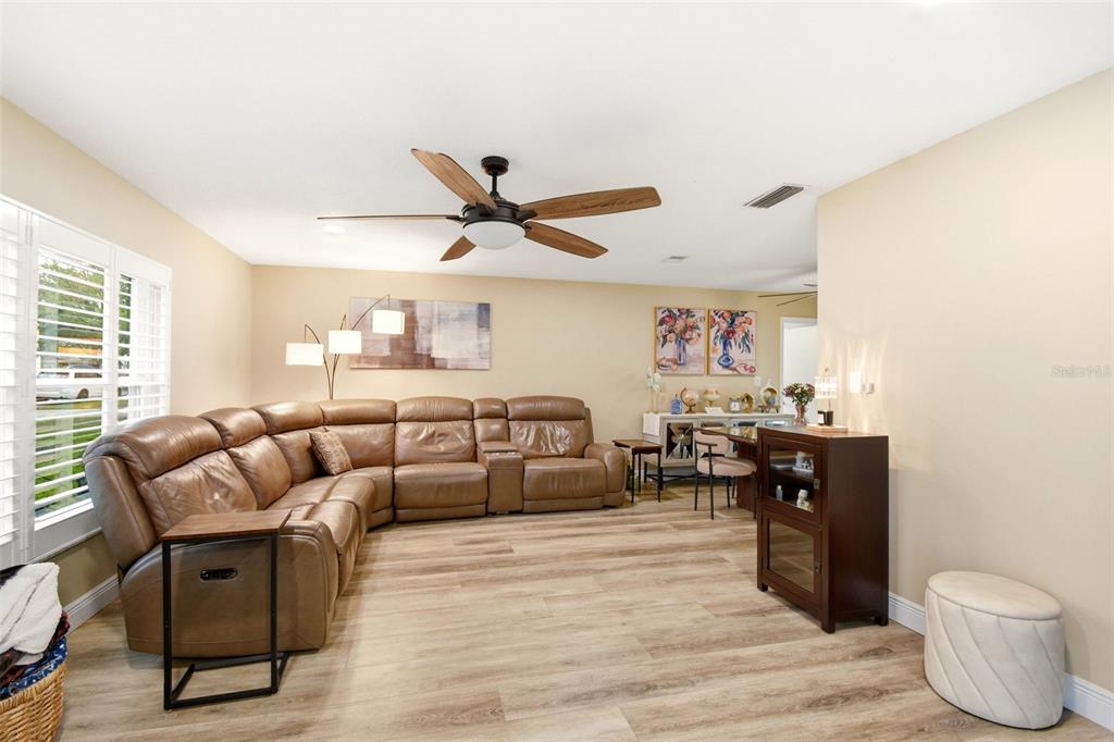 2636 Talbot Road Fern Park, FL 32730 - Photo 5 of 47 a living room with furniture and a wooden floor
