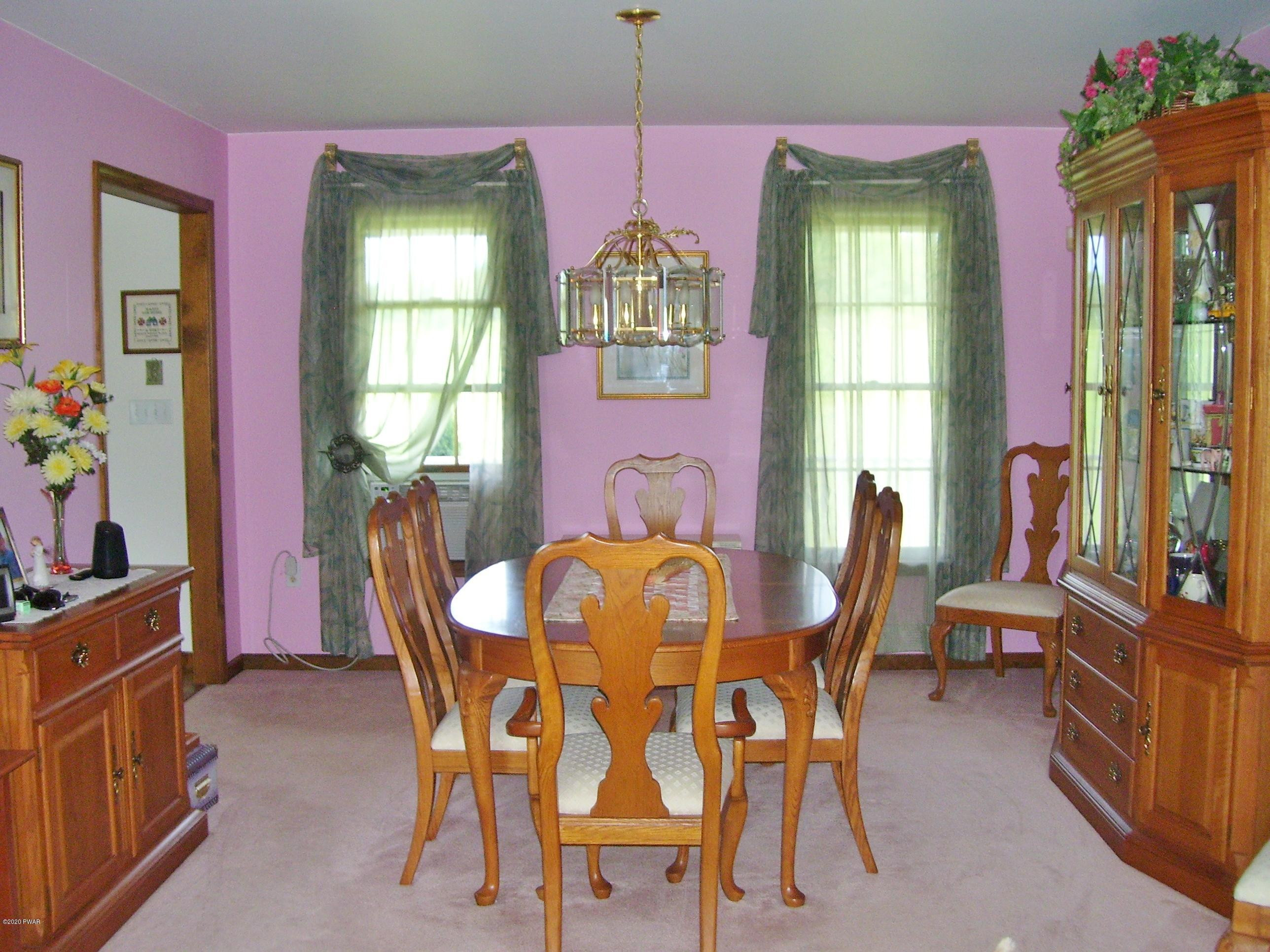 50 Layton Road Waymart, PA 18472 - Photo 11 of 61 a dining room with furniture and window