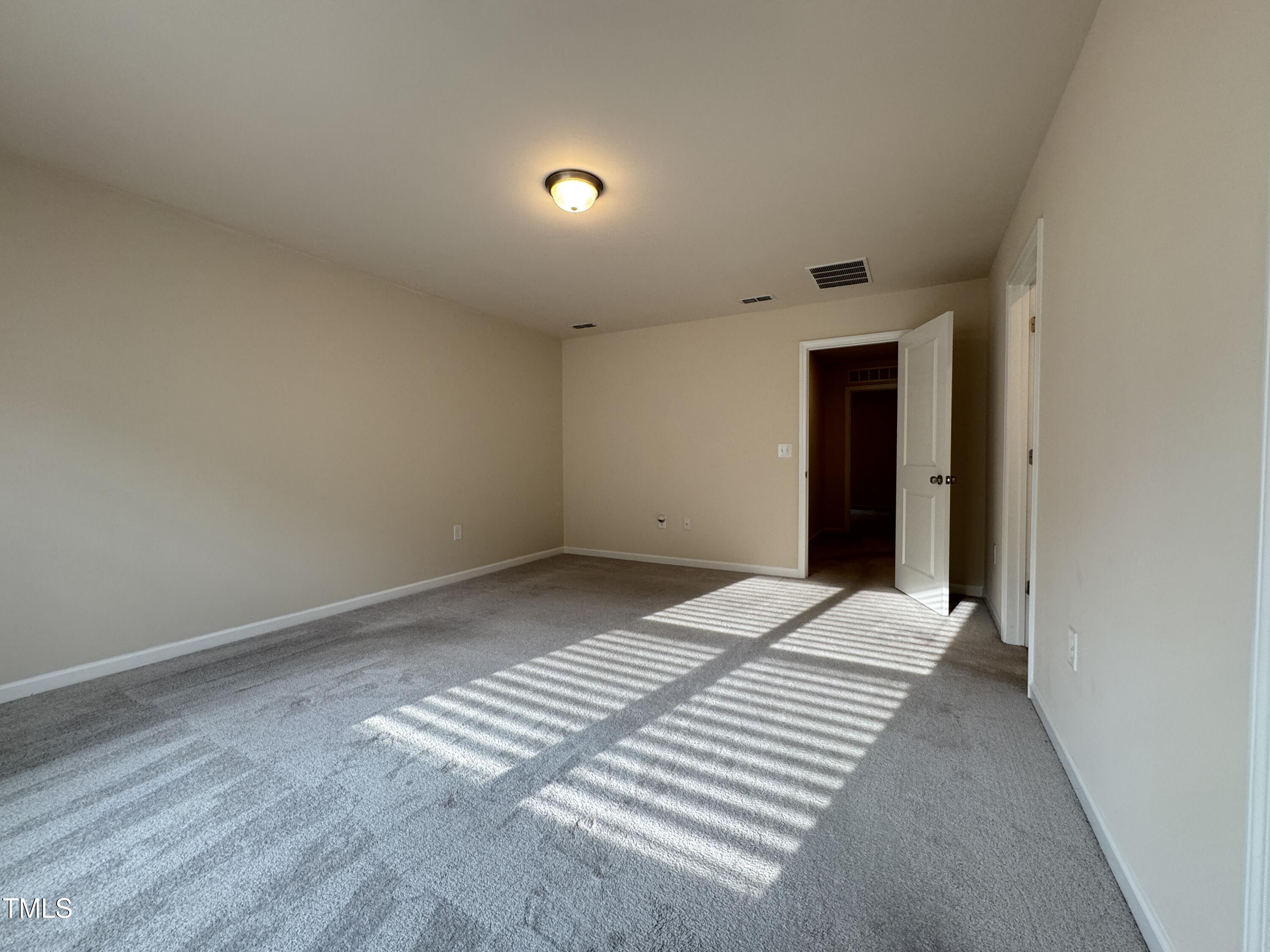 1413 Justice Union Court Raleigh, NC 27604 - Photo 13 of 29 a view of an empty room