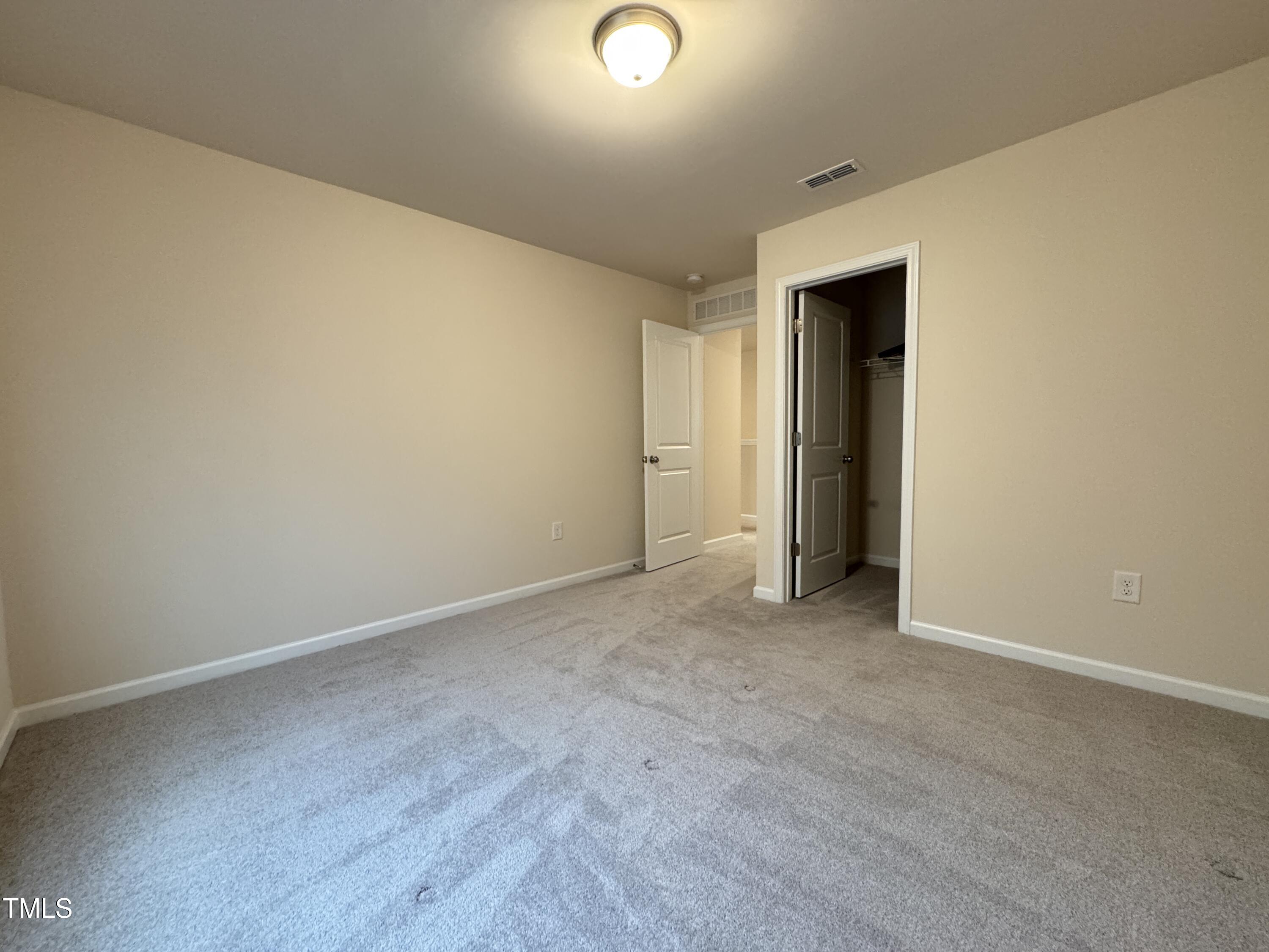 1413 Justice Union Court Raleigh, NC 27604 - Photo 17 of 29 a view of an empty room