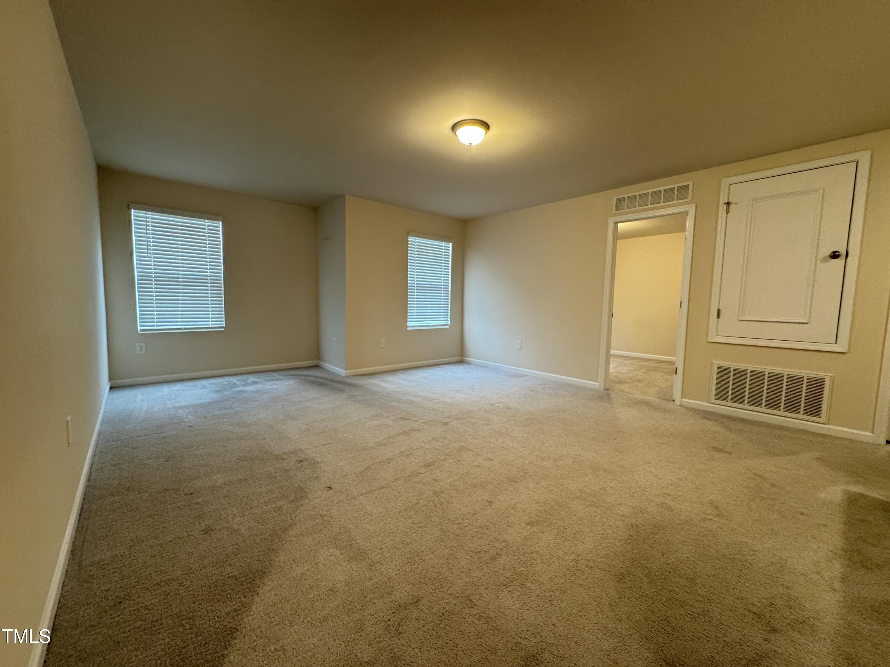 1413 Justice Union Court Raleigh, NC 27604 - Photo 18 of 29 a view of an empty room with a window