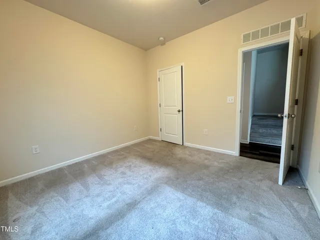 an empty room with a workbench
