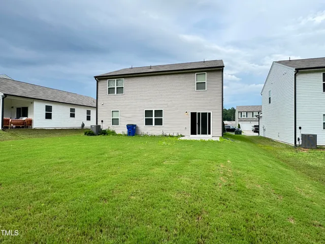 a house view with a garden space