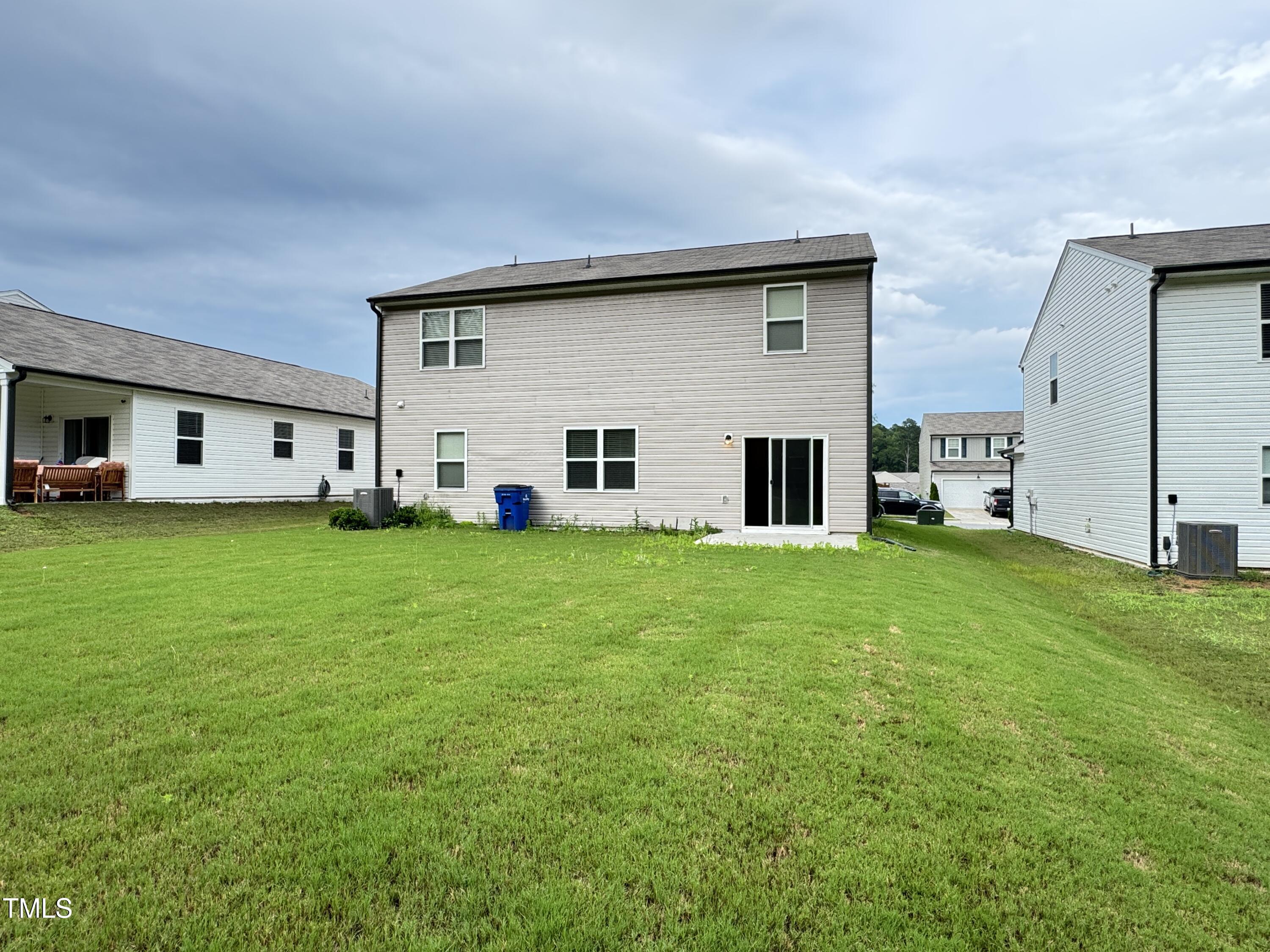 1413 Justice Union Court Raleigh, NC 27604 - Photo 27 of 29 a house view with a garden space