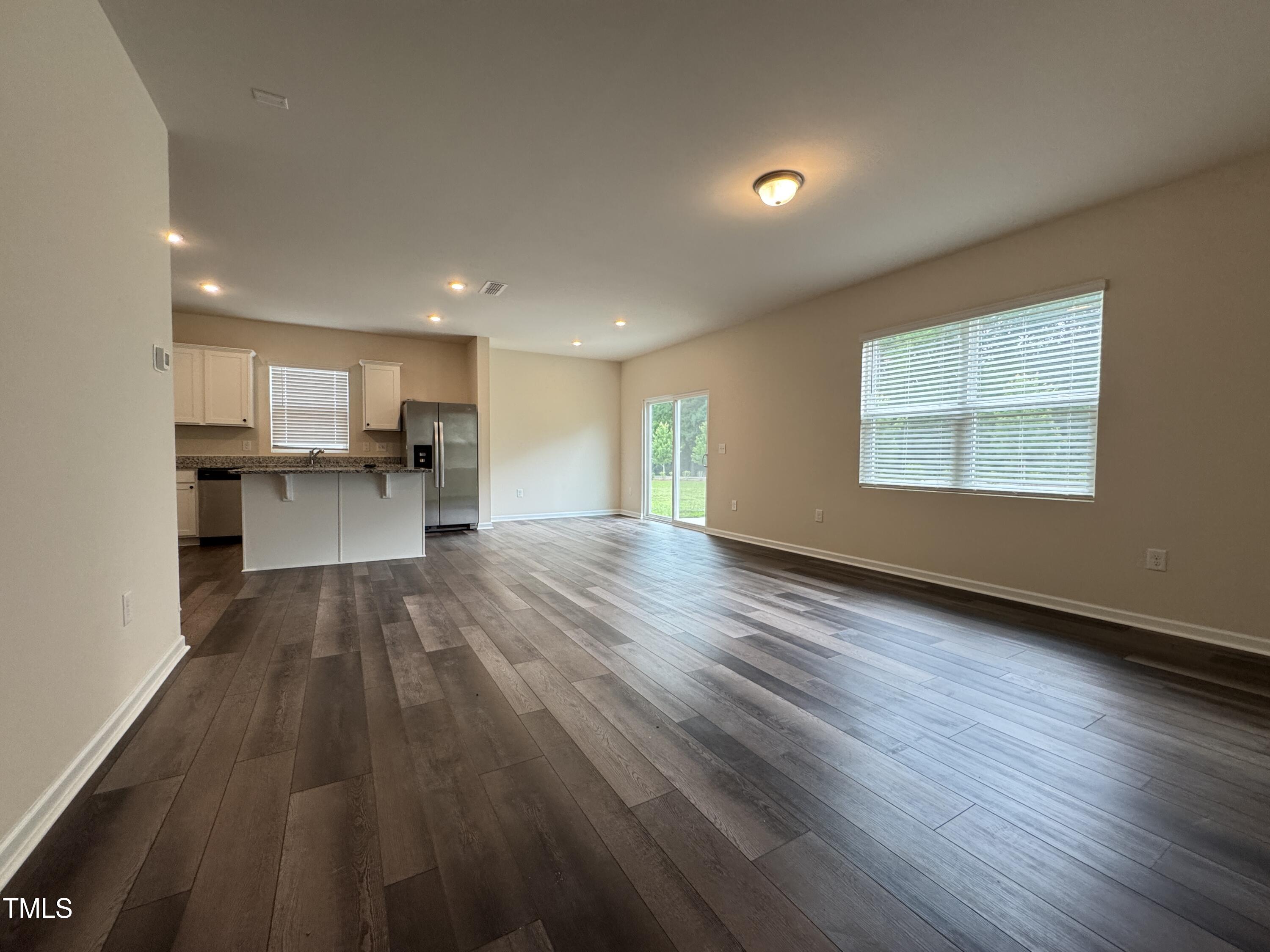 1413 Justice Union Court Raleigh, NC 27604 - Photo 4 of 29 a view of a kitchen with a sink and a window