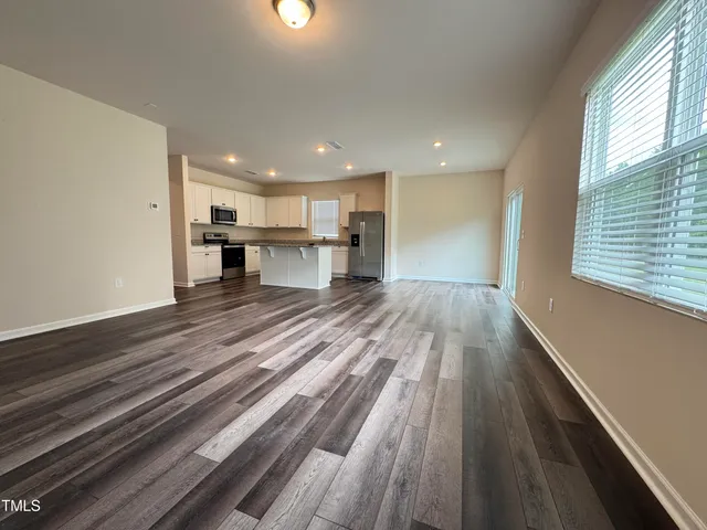a view of kitchen with wooden floor